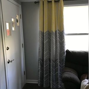 Grey, white and yellow lined curtains